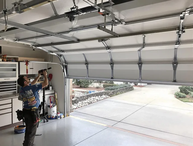 Garage door track repair service by Redlands Garage Door Repair in Redlands